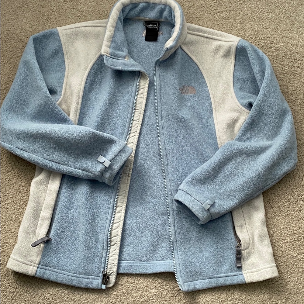 The North Face blue and creamy white fleece jacket in youth large